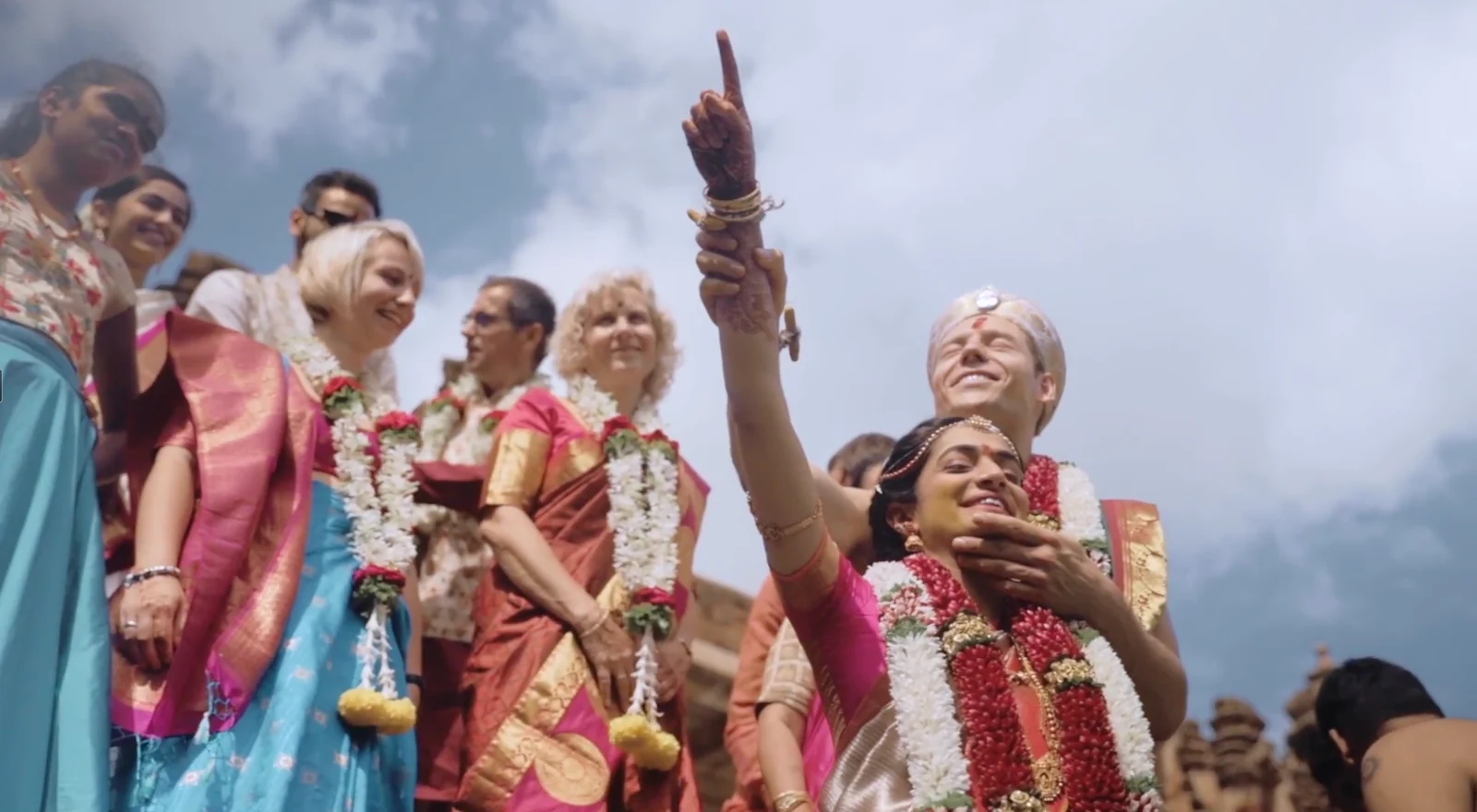 Jupp and Nandita celebrating beneath an open sky